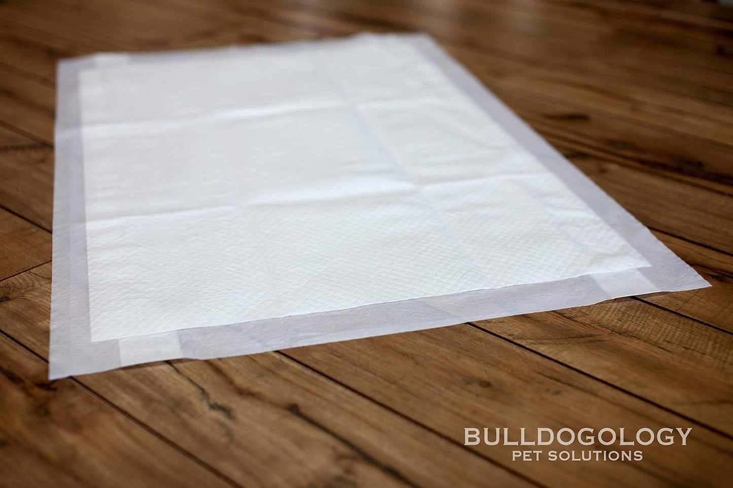 Bulldogology Puppy Pee Pads XL with Adhesive Sticky Tape - Extra Large Dog Training Wee Pads (24x35) 6 Layers with Extra Quick Dry Bullsorbent Polymer Tech (180-Count, White)
